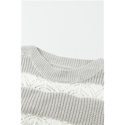 Серо-белый полосатый вязаный свитер с перфорацией