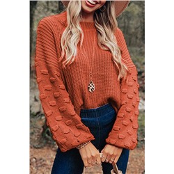 Оранжевый свитер с пышными рукавами в горошек